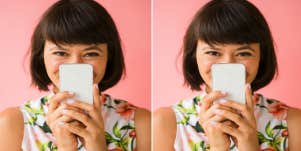 woman looking at her phone excited to learn how to text a guy