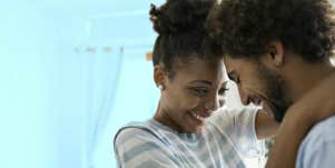 couple hugging after learning how to write a love letter