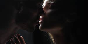 woman and man kissing