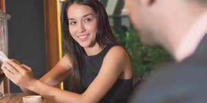 woman smiling at a man