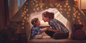 mom and child, in a tent at home