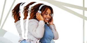 Curvy woman wearing headphones 