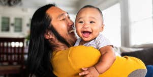 dad holding baby