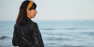 woman alone looking at the ocean