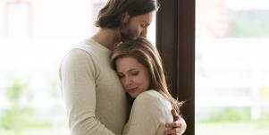husband and wife embracing