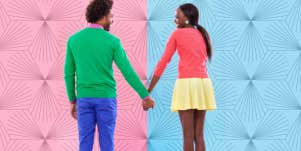 happy couple holding hands against a colorful background