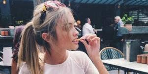 woman eating fries