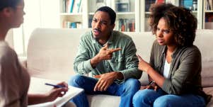 couple arguing in couples counselor's office