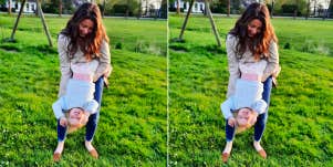 A mom playing with her daughter at the playground