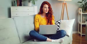 woman thinking with on the couch 