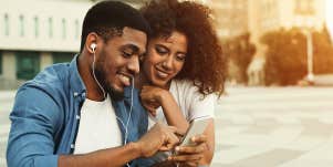 man and woman listening to music