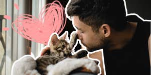 man and a little kitten