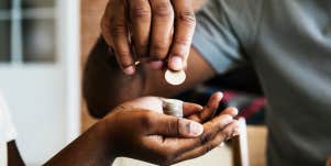 Man giving daughter money