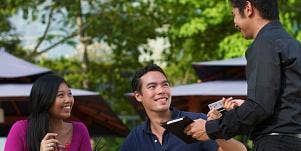 man paying for date
