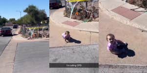 Baby crawling into street video