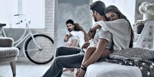 tense couple in bedroom