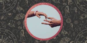 fingertips touching, astrology background