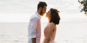 couple kissing on beach