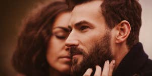 woman kissing a man