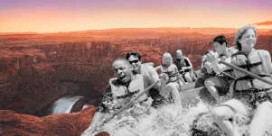 Middle aged woman white water rafting in the Grand Canyon 