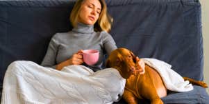 ex-wife sitting with her dog on the couch