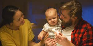 dad holding baby