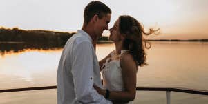 couple hugging on boat