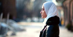 Somber woman outside