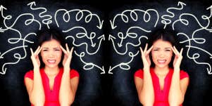 woman wincing with squiggled lines on chalkboard behind her