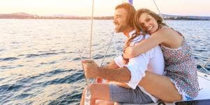 happy man and woman on a boat