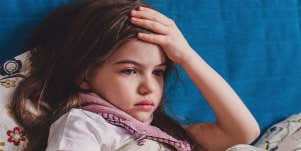 sick little girl in bed