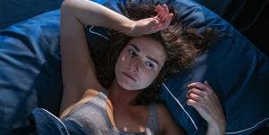 woman laying in bed