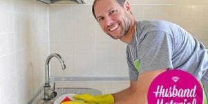 man washing dishes