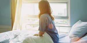 Woman in hospital bed