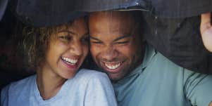 woman laughing with man