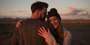 couple hugging during golden hour