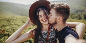 couple smiling kissing