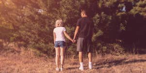 couple look into the woods