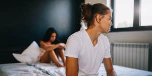 unhappy couple in bedroom