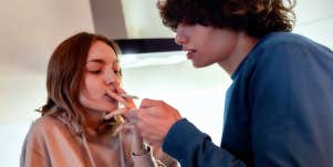 couple smoking marijuana