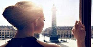 woman looks out at world