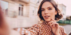 woman taking selfie 