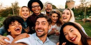 group selfie smiling laughing friends