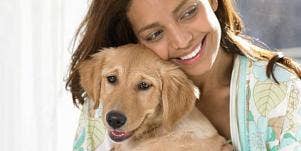 woman and puppy