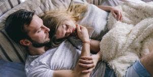 husband and wife in bed together