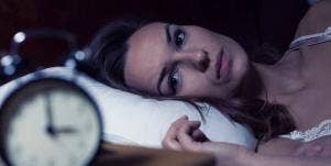 woman awake in bed