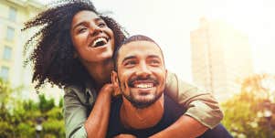 Happy couple outdoors in the city