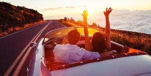 couple in car at sunset