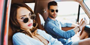 annoyed couple in car