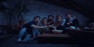 Group of friends watching the scariest movies